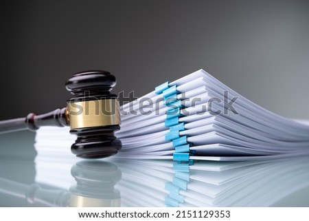 Piles Judicial Court Files And Judge Gavel Royalty-Free Stock Photo #2151129353