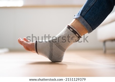 Ankle Sprain Bandage. Medical Foot Trauma Therapy Royalty-Free Stock Photo #2151129379