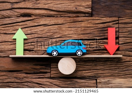 Vehicle Car Sales Market Price Up Down Royalty-Free Stock Photo #2151129465