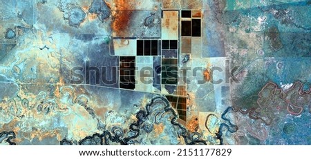 abstract landscape photo of the deserts of Africa from the air emulating the shapes and colors of the ultimate target, Genre: Abstract naturalism, from the abstract to the figurative