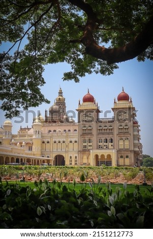 Mysuru, Karnataka, India-April 27 2022;A Portrait picture of the elegant Amba Vilas Mysore Palace as seen from the garden in Karnataka, India.
