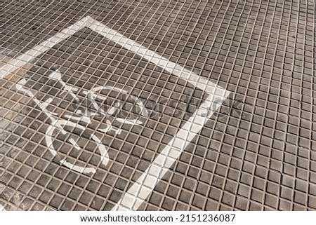 A photo of a cycle marking on a pavement