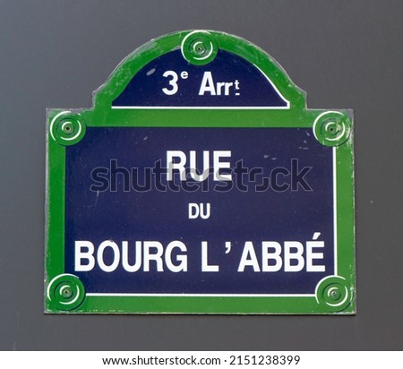 Rue du Bourg l'Abbe street sign, one of the most famous streets in Paris, France.
