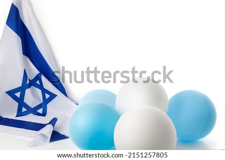 Items with the image of the Israeli flag. Patriotic holiday Independence day Israel - Yom Haatzmaut concept.