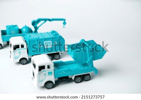 Garage recycle trucks toys on white background                              