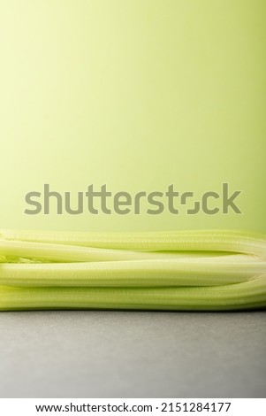 fresh celery on color background