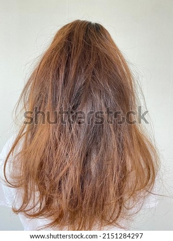 Dishevelled hair in the morning￼ Royalty-Free Stock Photo #2151284297