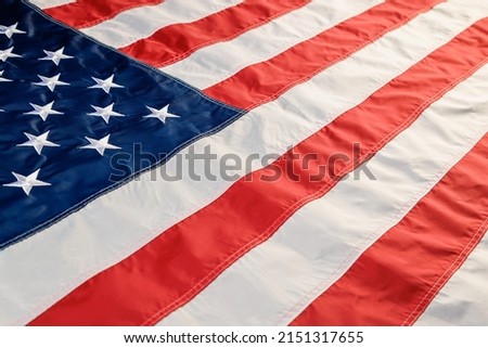 full-frame background of nylon sewed and embroided United States national flag - wide angle diagonal view
