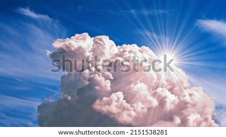  colorful dramatic sky with clouds, steaming cumulonimbus clouds reflect the rays of the morning sun.