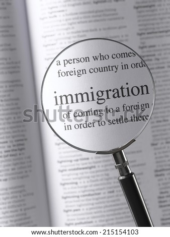 Magnifying Glass Highlighting Immigration
