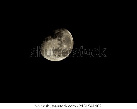 Almost Full Moon over a Dark Black Sky