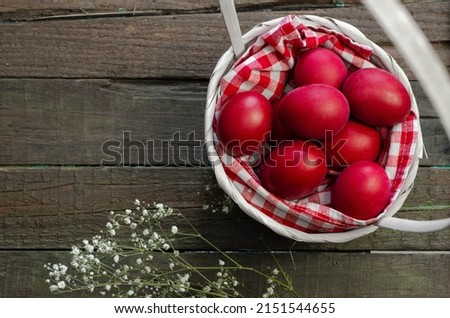 Easter egg basket on green grass on sunny day  Easter eggs on meadow in springtime  Stock image