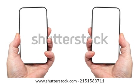 person holding a pair of mobile cell phones plain background cutout