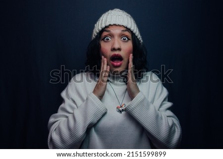 Studio photo of surprised girl