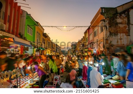 Phuket Walking Street night market in Phuket old town, Thailand. Royalty-Free Stock Photo #2151601425