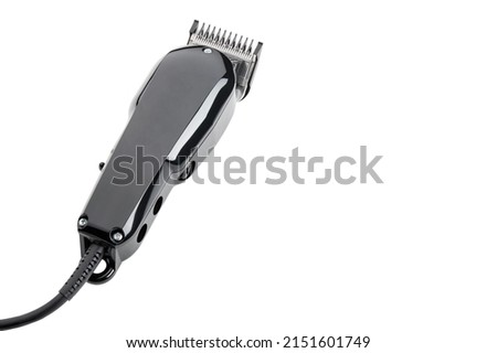 Hair clipper. Professional barber hair clipper for Men haircut. Hairdresser salon equipment. Premium hairdressing Accessories. Corded electric black hair clipper isolated on white background. Royalty-Free Stock Photo #2151601749