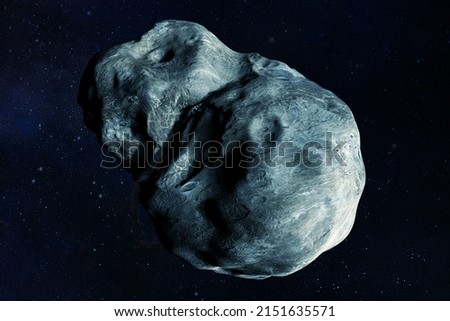 Asteroid on a dark background. Elements of this image furnished by NASA. High quality photo