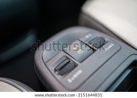 Car hand brake, parking button.