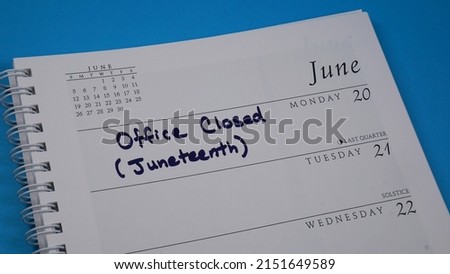 Office closure marked on a calendar on Monday, June 20, in observance of Juneteenth which falls on a Sunday                                Royalty-Free Stock Photo #2151649589