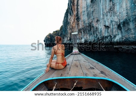 Travel on a long-tail boat in the sea in Krabi