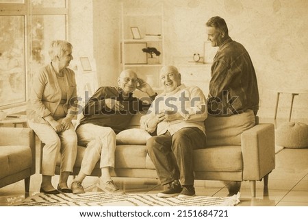 Old photo of senior people resting at home