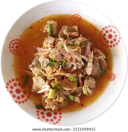 Thai style spicy pork salad. Spicy pork meat salad is traditional local Thai food popular in Thailand called Nam Tok Moo. Thai Issan Eastern Thailand Asian food concept.
