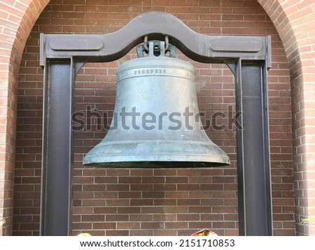 Bell in front of Parliament house at Victoria Island BC Canada Royalty-Free Stock Photo #2151710853
