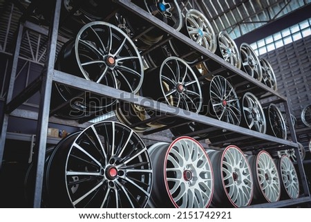 Rows of metal car disks in a shop Royalty-Free Stock Photo #2151742921