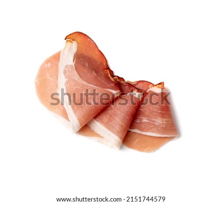 Prosciutto isolated. Spanish jamon slices, parma ham, sliced serrano, iberico, spanish ham, cured meat snack on white background top view Royalty-Free Stock Photo #2151744579