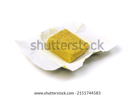 Stock cube isolated. Vegetable stock concentrat, broth cubes, bouillon cube, instant spice soup ingredient in wrapper on white background top view