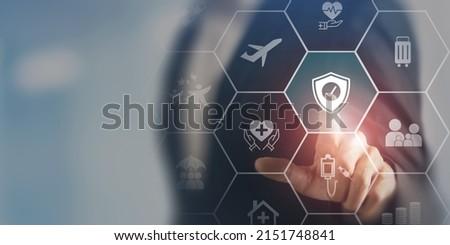 Travel safety and travel insurance concept. Touching on protect safety travel icon. Intended to cover medical expenses, trip cancellation, lost luggage and other losses incurred while traveling. Royalty-Free Stock Photo #2151748841