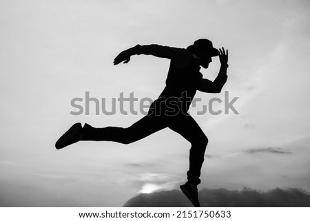 Let freedom ring. stamina and energy. need the inspiration. man feel motivation. challenge to himself. man runner silhouette on sky background. confidence and success. run to successful future Royalty-Free Stock Photo #2151750633