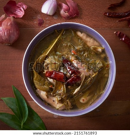 Tradition Thai Food Braised Pork Belly with Cowa Leaves Royalty-Free Stock Photo #2151761893