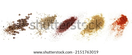 Set allspice, anise seeds spice (Pimpinella anisum), ground sumac spice, Tikka masala  powder mix and red paprika isolated on white, top view  Royalty-Free Stock Photo #2151763019