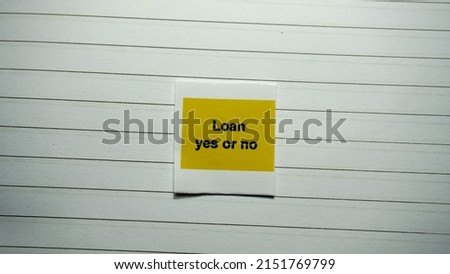 Loan yes or no words in a black line background paper. Business, signs, and symbols, lifestyle motivational and emotional concepts. Copy space.