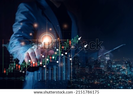 Businessman planning to invest in stock market. man touching success goals icon on virtual screen, stock graph is rising, economy is recovering, stock trading, business start up, business success.