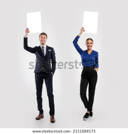 Announcement Concept. Set Of Confident Businesspeople Holding White Advertisement Board In Hands, Standing Isolated On White Studio Background, Raising Lifting Sign Board Up, Full Body Length, Banner