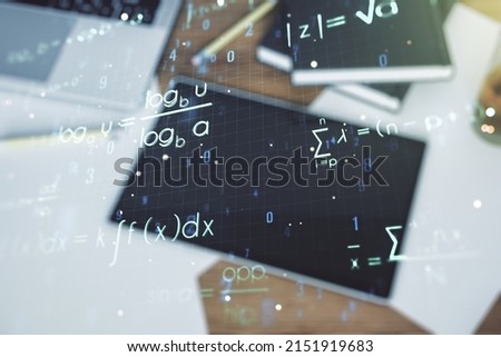Creative scientific formula concept and modern digital tablet on background, top view. Multiexposure