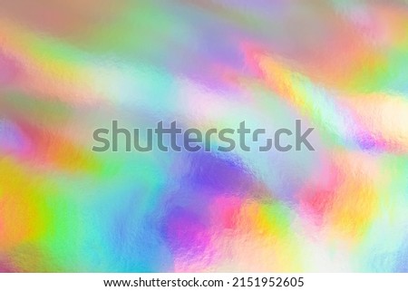 Holographic foil background. Abstract shiny festive backdrop