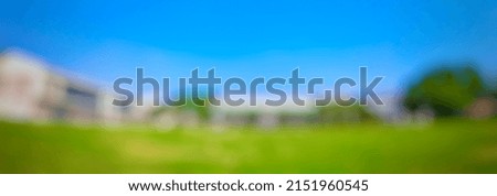 Blur picture show landscape of school in thailand green and blue sky