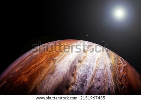 Planet Jupiter on a dark background. Elements of this image furnished by NASA. High quality photo