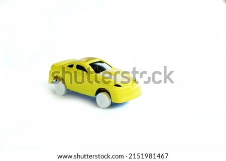 plastic car toy for children study first control vehicle on white background.