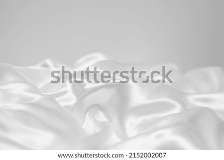 Shiny linen surface. Fabric background. Softness of the fabric.