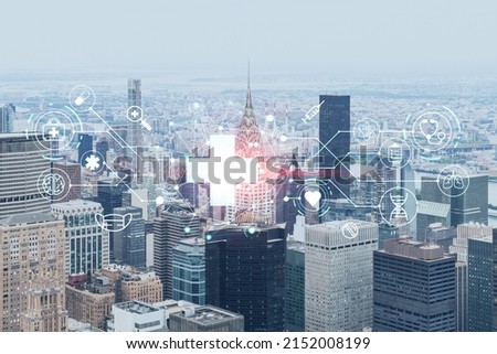 Aerial panoramic city view of Upper Manhattan, the East Side, river and Brooklyn on horizon, New York city, USA. Health care digital medicine hologram. The concept of treatment and disease prevention