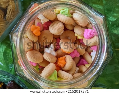 gem rose biscuits in a jar in high angle portrait.