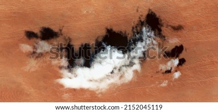 abstract landscape photo of the deserts of Africa from the air emulating the shapes and colors of the good shadow, Genre: Abstract naturalism, from the abstract to the figurative