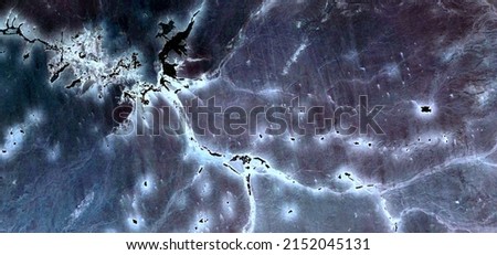 abstract landscape photo of the deserts of Africa from the air emulating the shapes and colors of electric storm,Genre: Abstract naturalism, from the abstract to the figurative