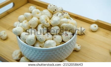 Prickly Water Lily. Dried makhana also known as water lily. Fox nut. Makhanas. Lotus seeds.The edible seeds, called fox nuts or makhana when dried, are eaten in Asia.