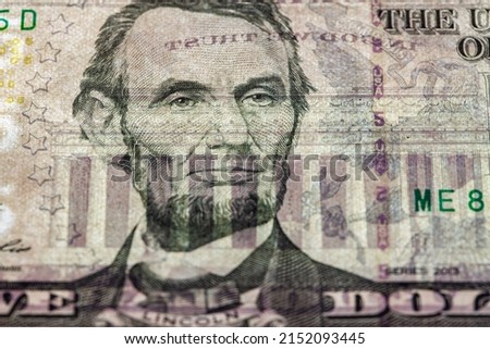 fragment of 5 dollar banknote with visible details of banknote reverse for design purpose