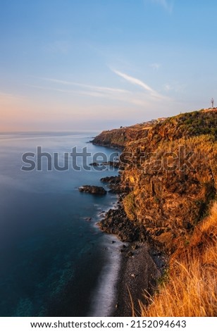 Coastline Madeira near highway along Santa Cruz, Madeira, Portugal. October 2021. Long exposure picture